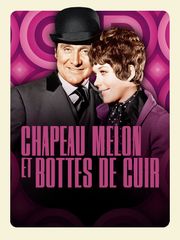 Chapeau melon et bottes de cuir
