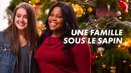 Une famille sous le sapin