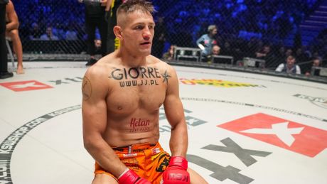 KSW Background: Andrzej Grzebyk / Tymoteusz Łopaczyk